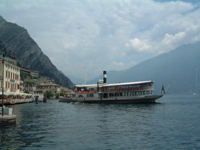 The paddle steamer docks on the north side of town The paddle steamer docks on the north side of town