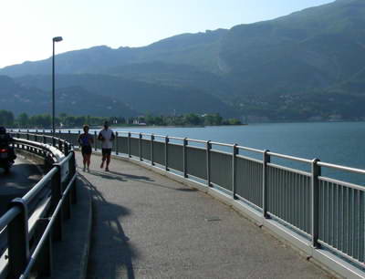 Running by the lake in the early morning is great in the summer Running by the lake in the early morning is great in the summer