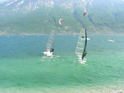 Windsurfing with a friend is a lot of fun Windsurfing with a friend is a lot of fun