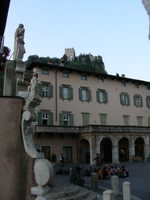 The impossibly located castle perched behind buildings at the town centre of Arco!