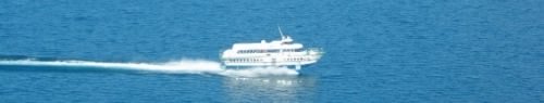 Hydrofoil skimming over the blue waters of the lake