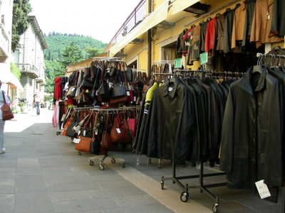 A typical Garda shop with leather goods out  the front on display.